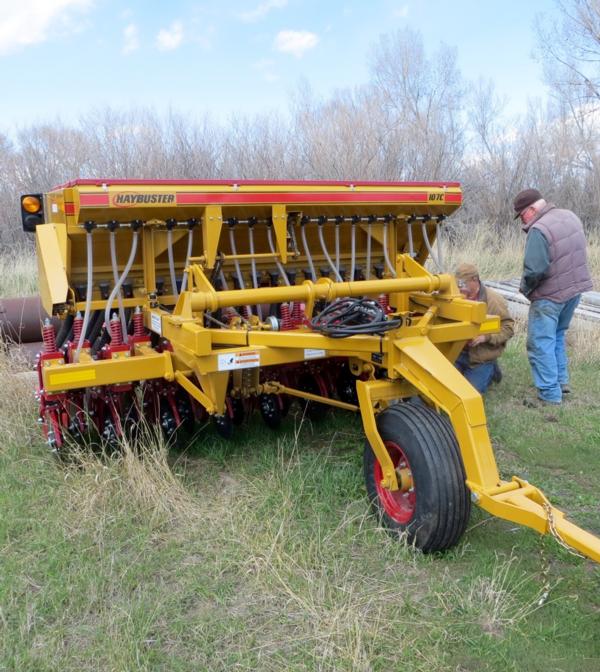 Headwaters Chapter member inspects new FWP's no-till drill at Canyon Ferry.
